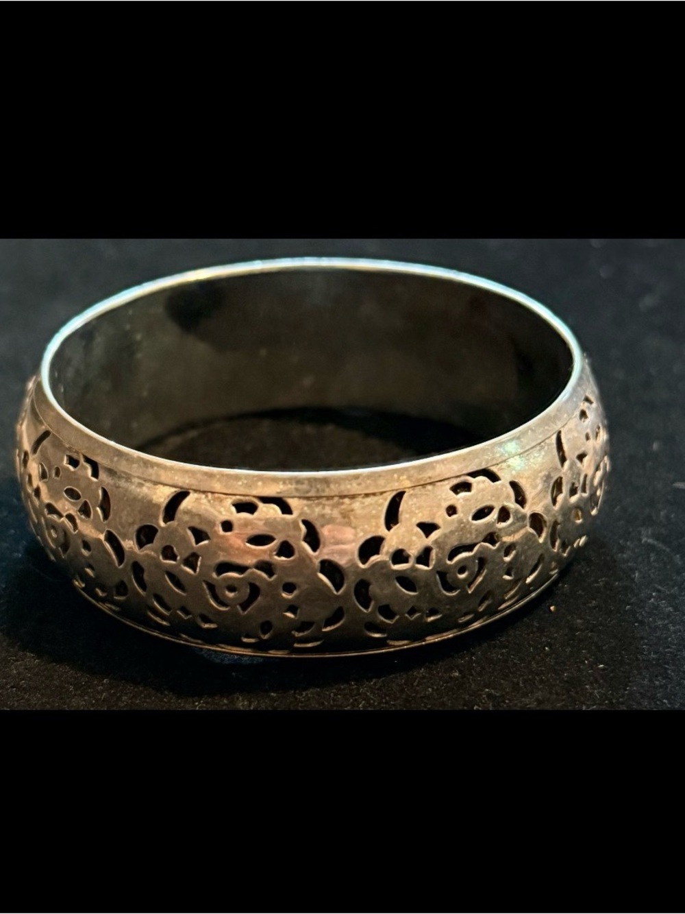 Vintage Silver Bangle Bracelet with Intricate Floral Design